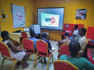 Classroom of young people watching the WordPress 101 videos as part of a tech bootcamp at Uwani Hub in Nigeria.